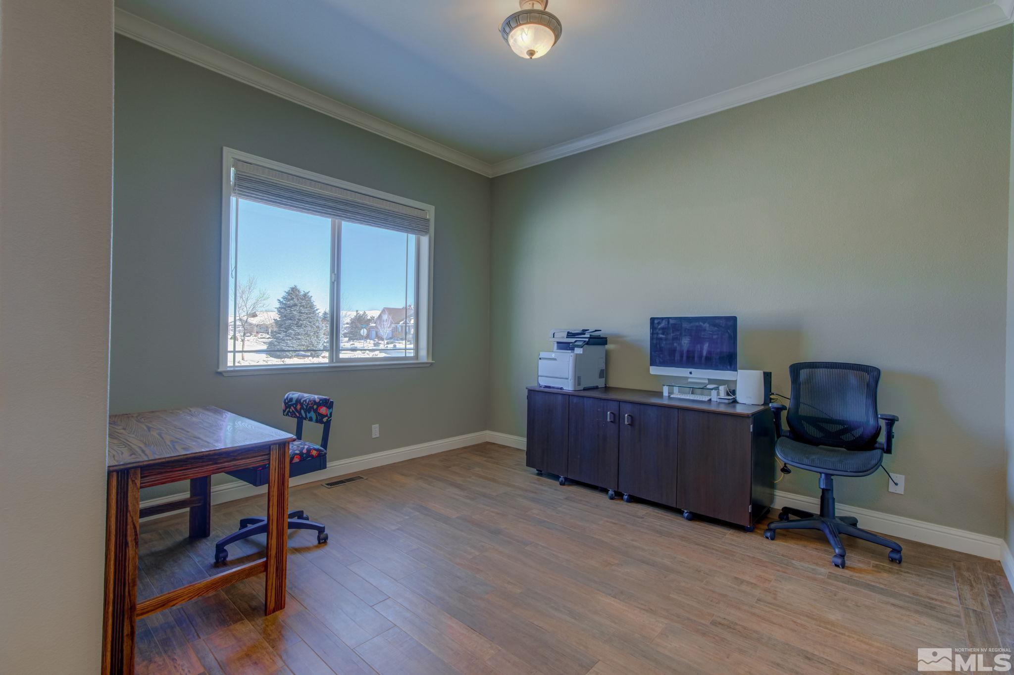 1122 North Fork Trail Minden, NV 89423 - Photo 20 of 40 a view of a workspace with furniture and a workspace