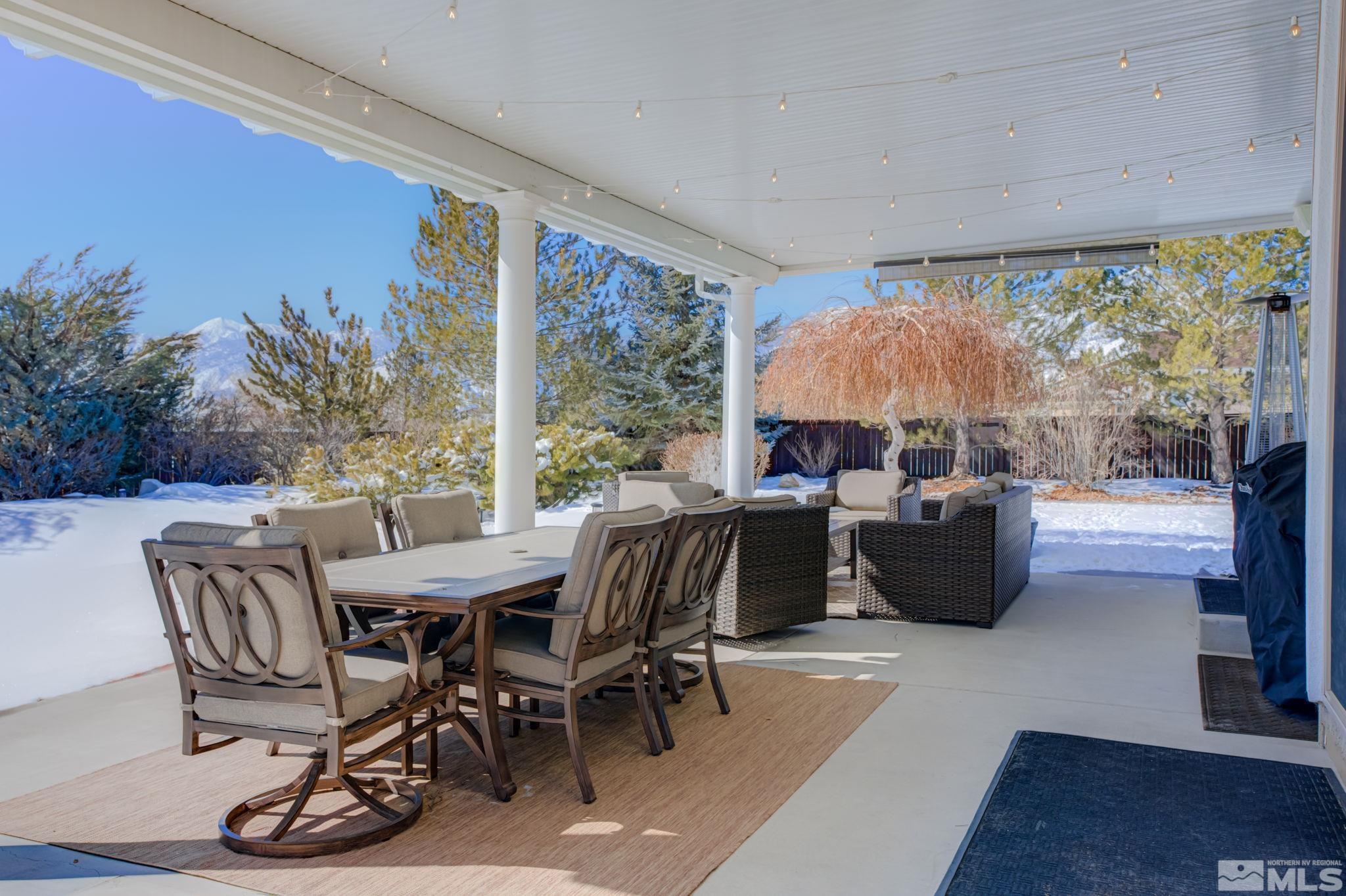 1122 North Fork Trail Minden, NV 89423 - Photo 33 of 40 a view of a dining room with furniture window and outside view