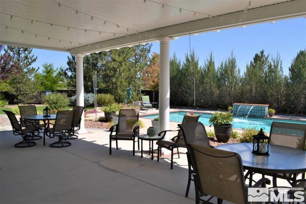 1122 North Fork Trail Minden, NV 89423 - Photo 38 of 40 a view of a tables and chairs in patio