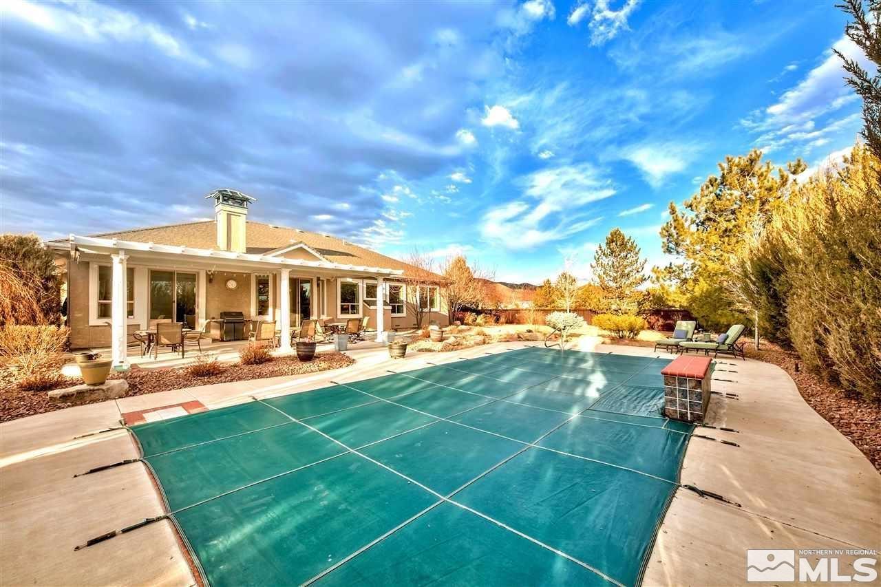 1122 North Fork Trail Minden, NV 89423 - Photo 39 of 40 a view of a house with backyard porch and sitting area