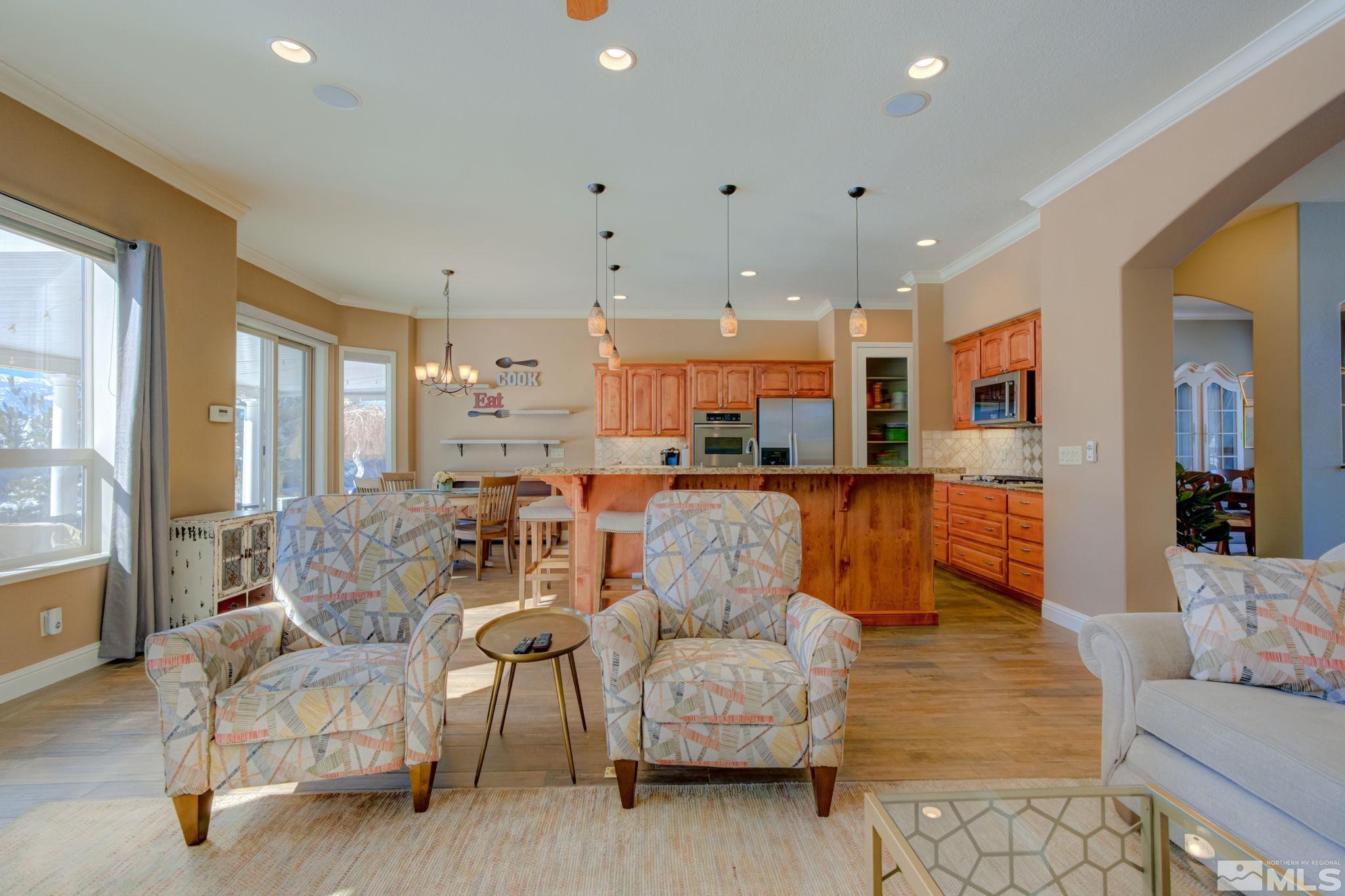 1122 North Fork Trail Minden, NV 89423 - Photo 6 of 40 a living room with furniture and a large window