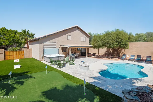 a view of living room filled with furniture and furniture