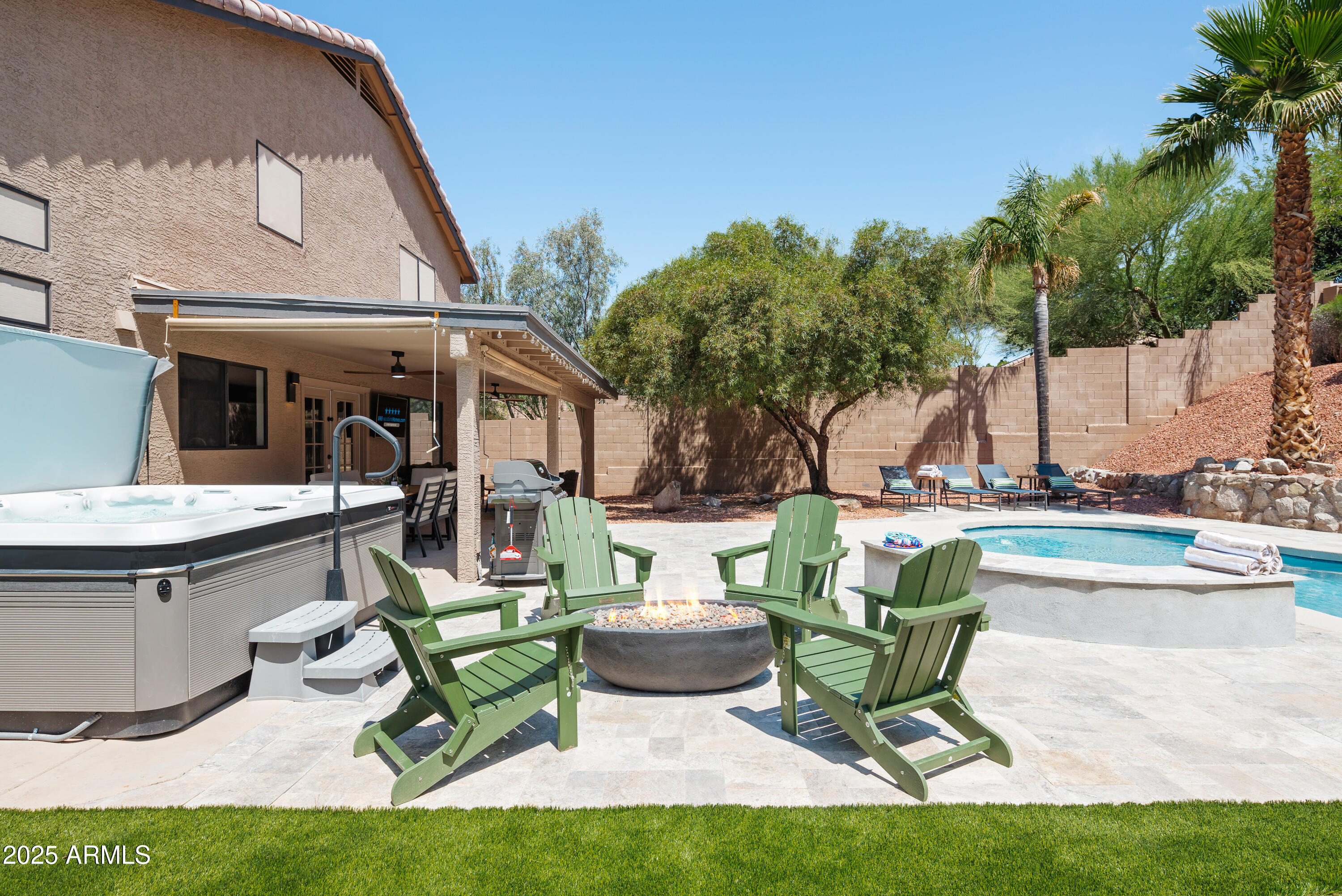 20619 North 16th Way Phoenix, AZ 85024 - Photo 2 of 64 a view of a swimming pool with chairs