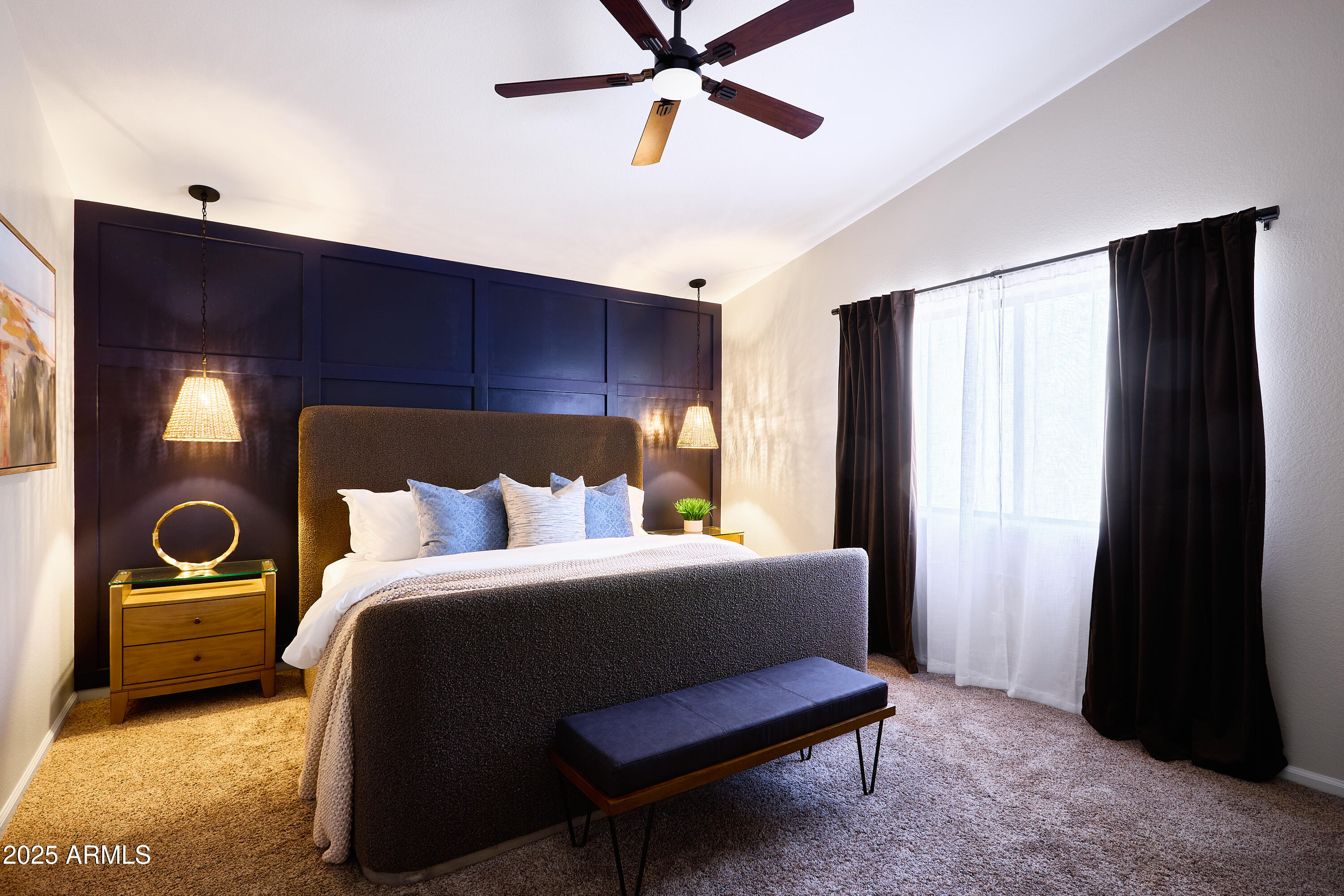 20619 North 16th Way Phoenix, AZ 85024 - Photo 25 of 64 a bedroom with a bed and a chandelier