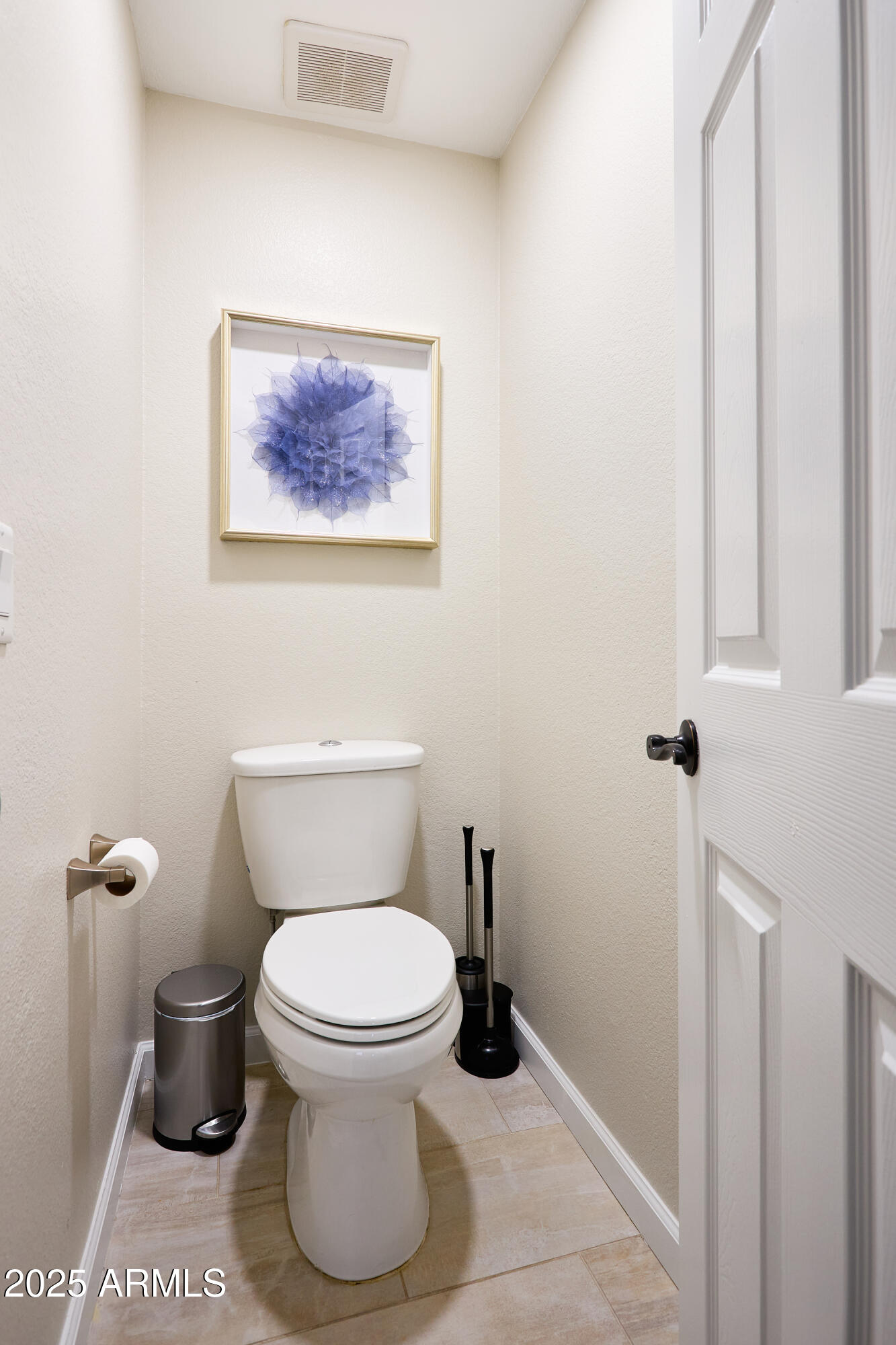 20619 North 16th Way Phoenix, AZ 85024 - Photo 32 of 64 a white toilet sitting next to a bathroom sink