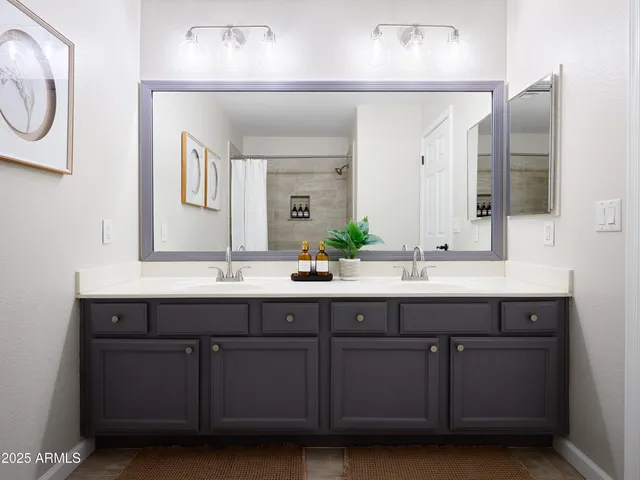 a kitchen with stainless steel appliances kitchen island granite countertop a stove and a sink