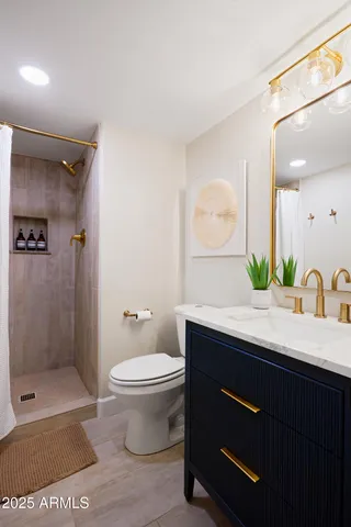 a living room with furniture a table and a large window