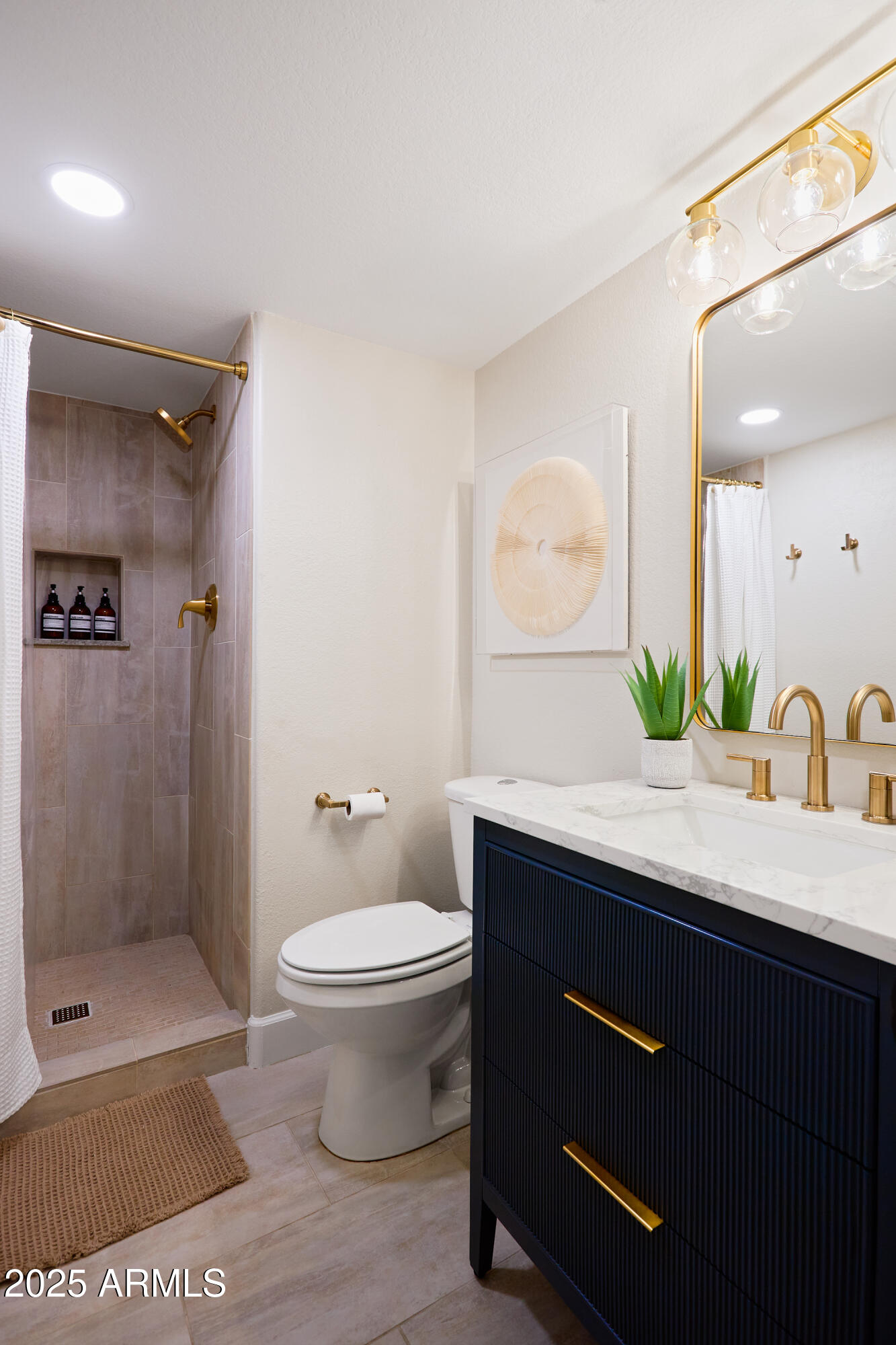 20619 North 16th Way Phoenix, AZ 85024 - Photo 42 of 64 a bathroom with a sink a toilet and shower