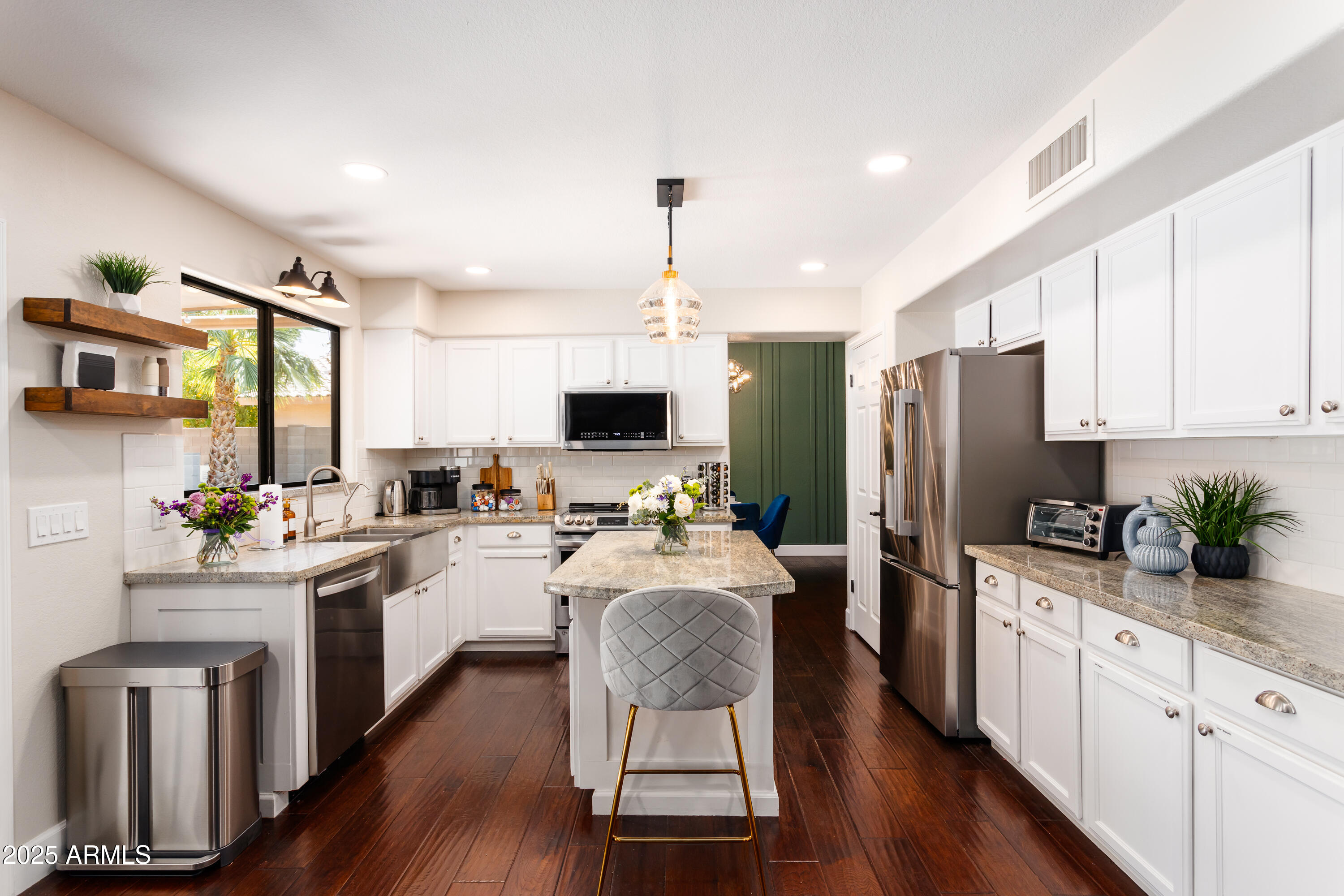 20619 North 16th Way Phoenix, AZ 85024 - Photo 45 of 64 a kitchen with sink a refrigerator and cabinets