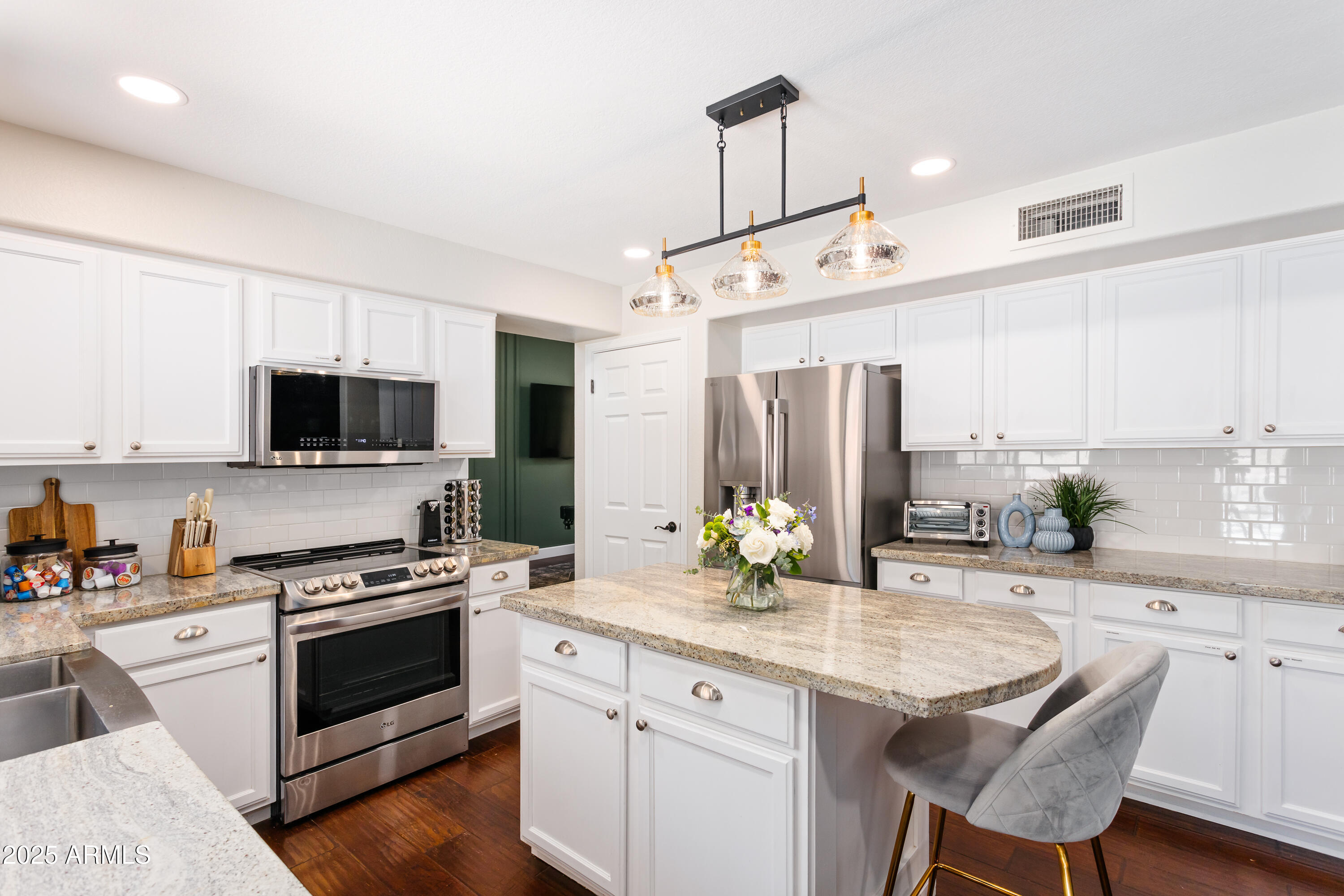20619 North 16th Way Phoenix, AZ 85024 - Photo 8 of 64 a kitchen with a sink stove and microwave