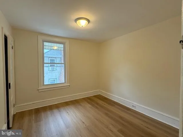a bathroom with a sink toilet and mirror