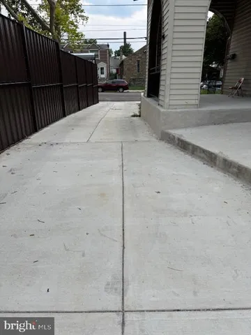 a kitchen with stainless steel appliances granite countertop a stove a refrigerator and a stove