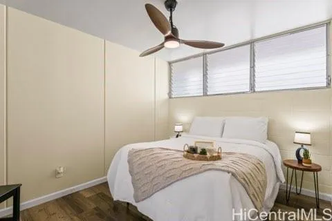 a bedroom with a bed and chair