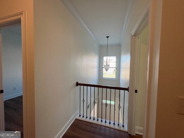 5375 Rialto Way Cumming, GA 30040 - Photo 12 of 42 a view of a hallway with wooden floor and staircase