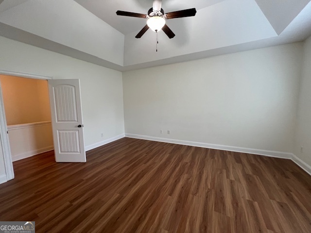 5375 Rialto Way Cumming, GA 30040 - Photo 34 of 42 an empty room with wooden floor chandelier fan and windows