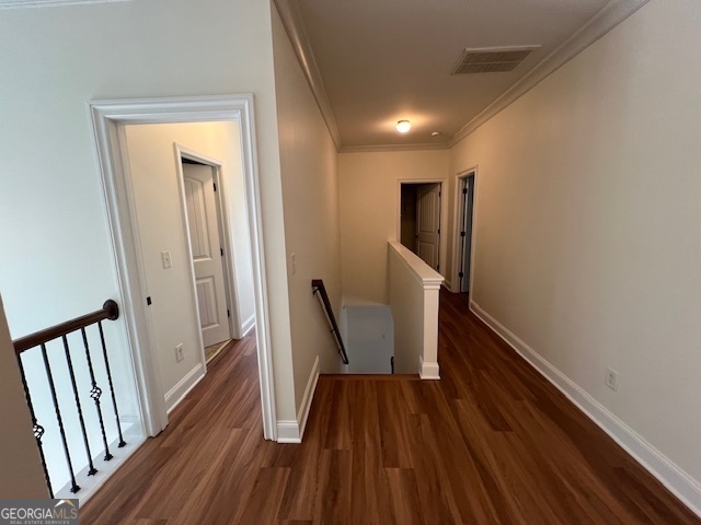 5375 Rialto Way Cumming, GA 30040 - Photo 38 of 42 a view of a hallway with wooden floor and stairs