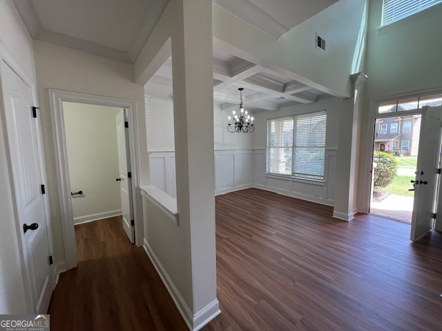 5375 Rialto Way Cumming, GA 30040 - Photo 4 of 42 a view of a hallway with wooden floor and a living room