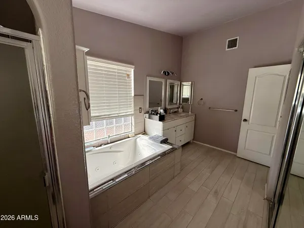 a view of a storage and utility room with a window