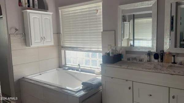 a bathroom with a sink and a bathtub