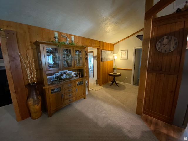 1061 Copper Street Stockton, UT 84071 - Photo 38 of 43 Wood-paneled interior walls and built-in wood cabinetry characterize this area