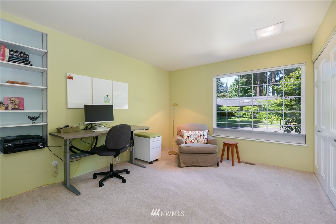 13546 Sherman Road Northwest Seattle, WA 98177 - Photo 14 of 33 a livingroom with workspace and a window