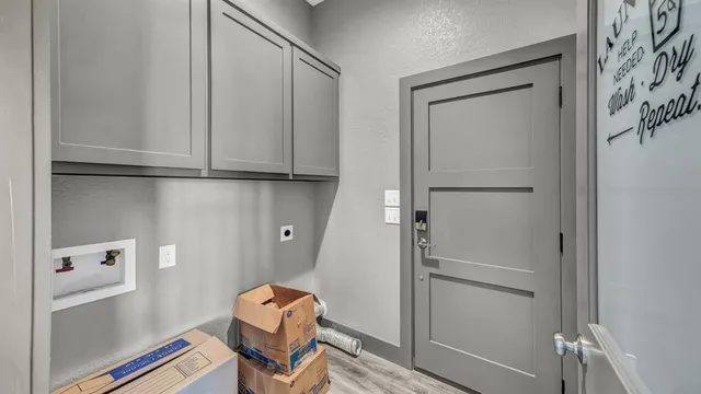 a room with a chair and wooden floor