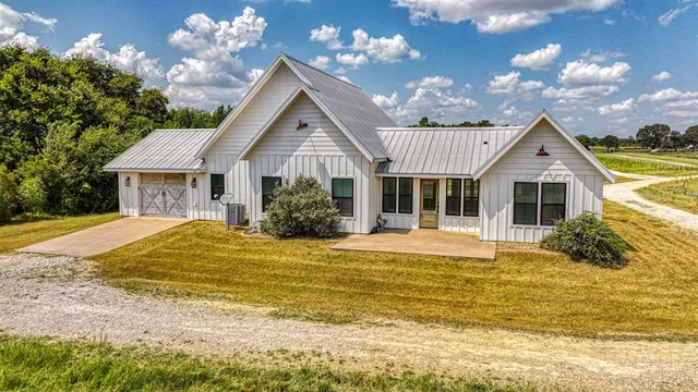 a view of a house with a swimming pool