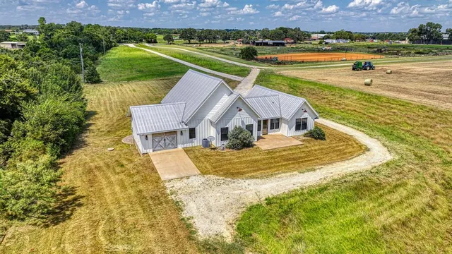 a view of a house with a ocean view
