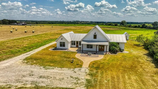 a view of a swimming pool with an ocean view