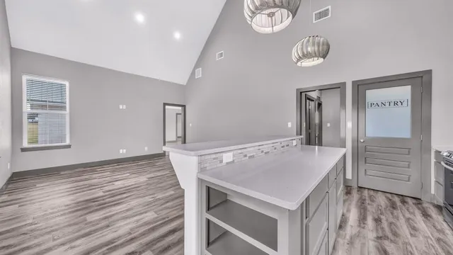 a view of a dining table and chairs