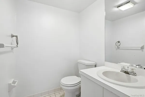 a bathroom with a sink and a toilet