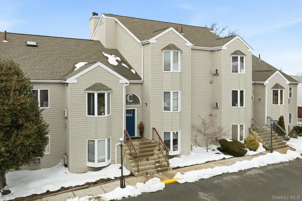 a front view of a house with entertaining space