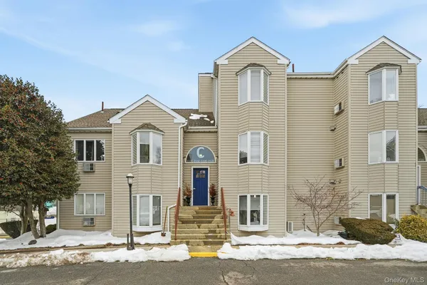 a front view of a house with street