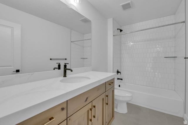 2821 Scarlet Road, Unit 149 Eagle Mountain, UT 84005 - Photo 20 of 28 Bathroom #3, featuring a light wood-finish vanity with gold-tone hardware, a white Quartz countertop, and a large wall-mounted mirror.