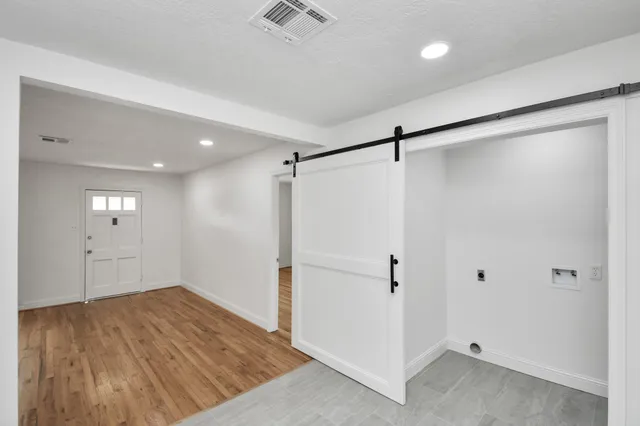 a view of a room with an empty space