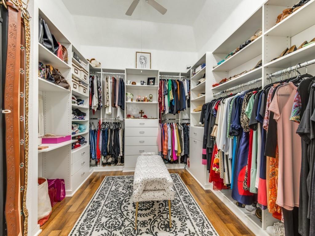 9962 Bell Rock Road Frisco, TX 75035 - Photo 16 of 28 a view of walk in closet with clothes