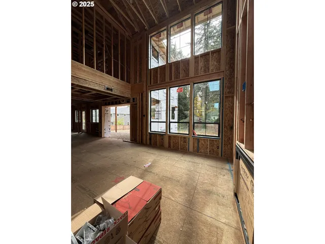 a view of a livingroom with furniture and windows