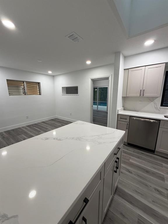 731 Bongart Road Winter Park, FL 32792 - Photo 11 of 28 a kitchen with a stove a sink and a refrigerator