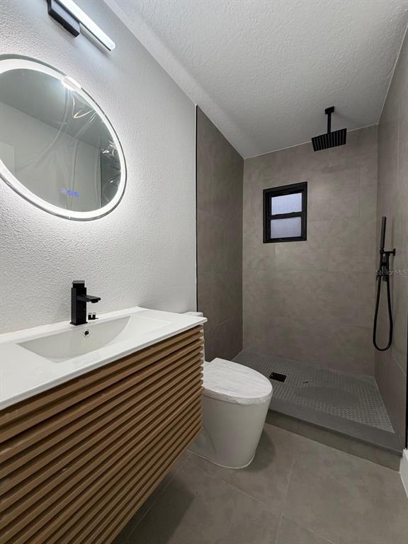 731 Bongart Road Winter Park, FL 32792 - Photo 18 of 28 a bathroom with a sink a toilet and a mirror