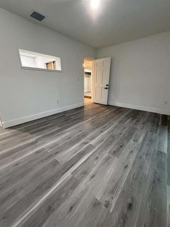 731 Bongart Road Winter Park, FL 32792 - Photo 20 of 28 a view of empty room with wooden floor