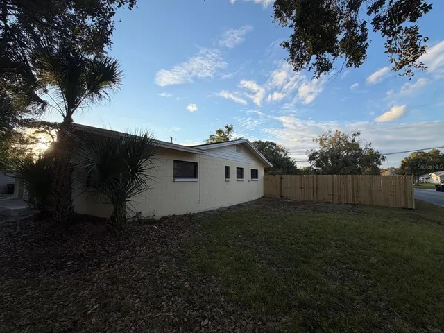 a view of a house with a patio