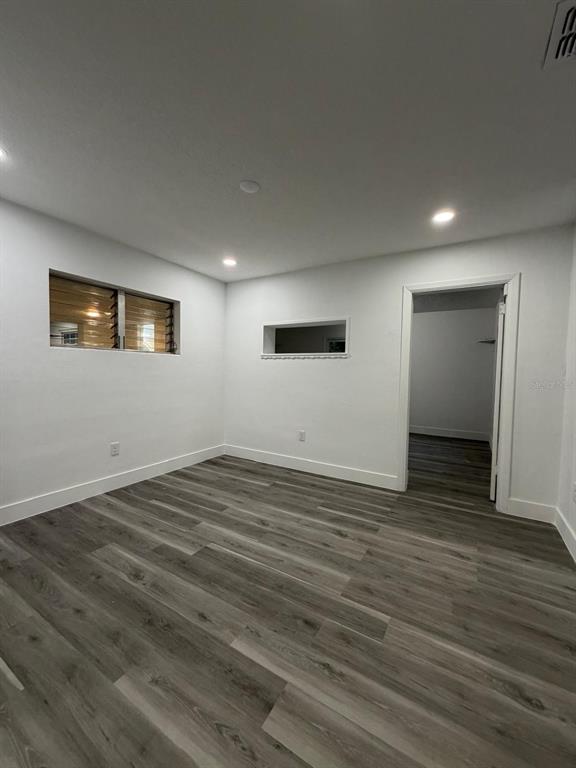 731 Bongart Road Winter Park, FL 32792 - Photo 6 of 28 a view of a livingroom with wooden floor and window
