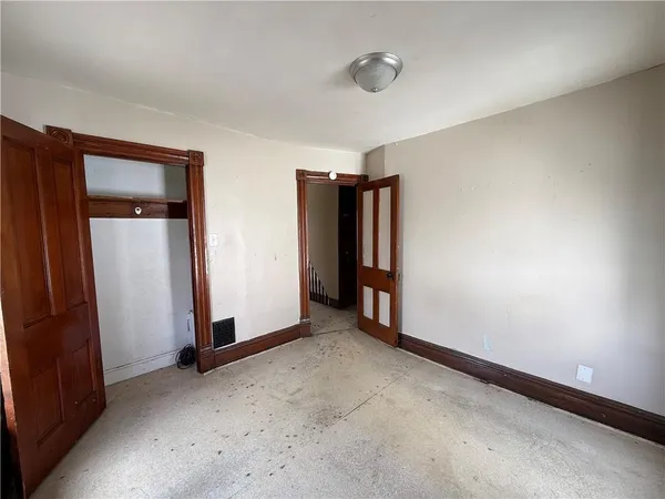 an empty room with closet