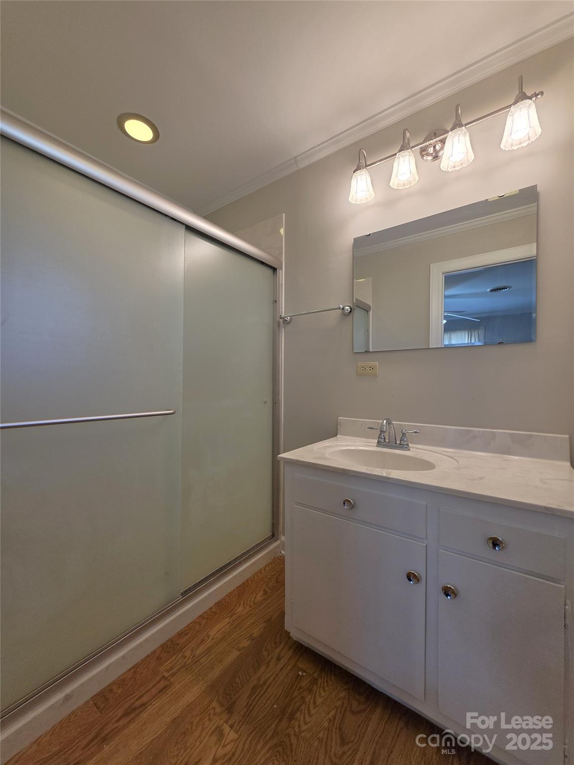 9301 Gold Hill Road Mount Pleasant, NC 28124 - Photo 19 of 32 a bathroom with a granite countertop sink mirror and vanity