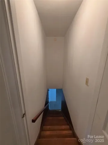 a view of hallway with stairs