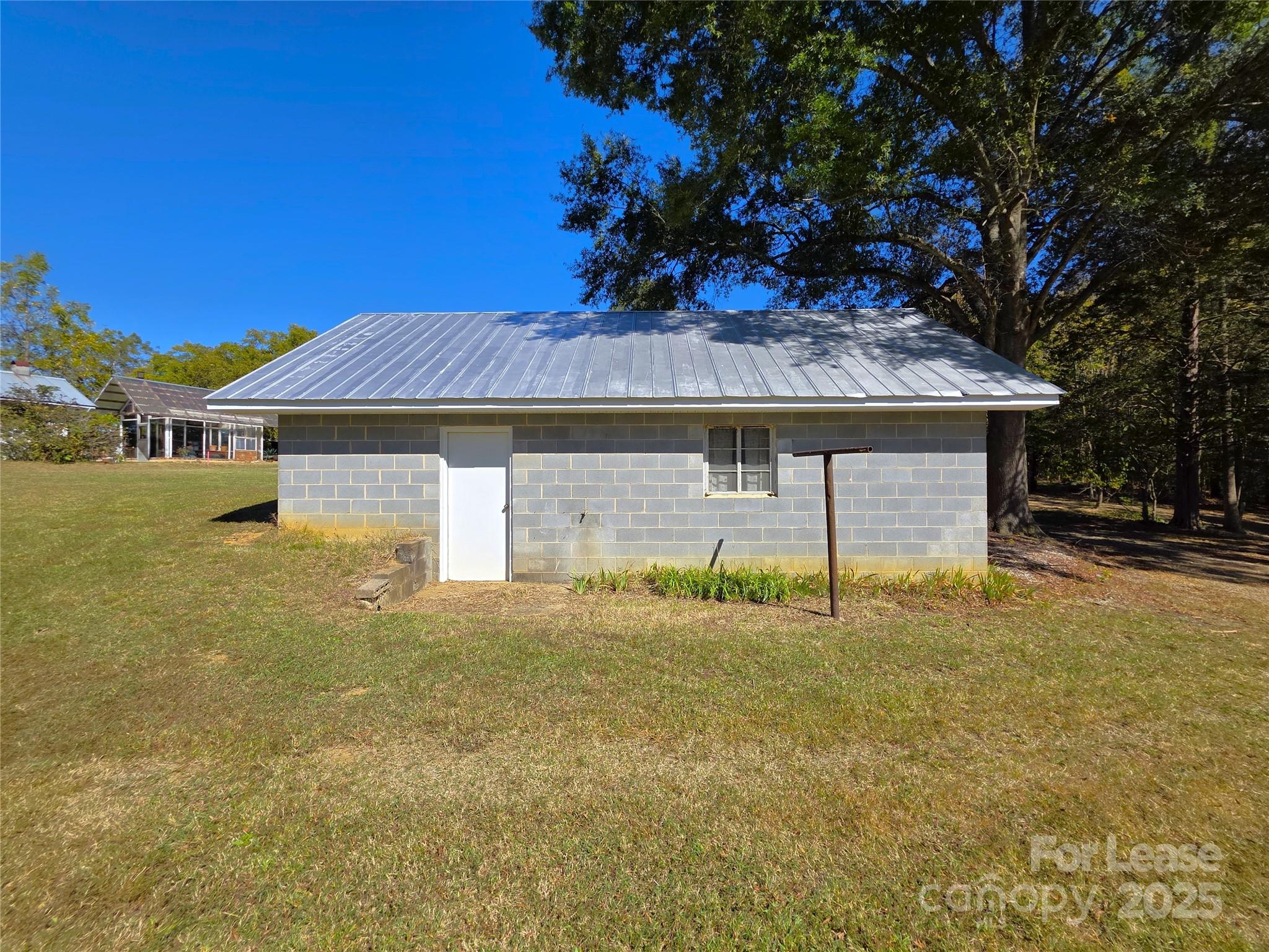 9301 Gold Hill Road Mount Pleasant, NC 28124 - Photo 31 of 32 a front view of a house with a yard