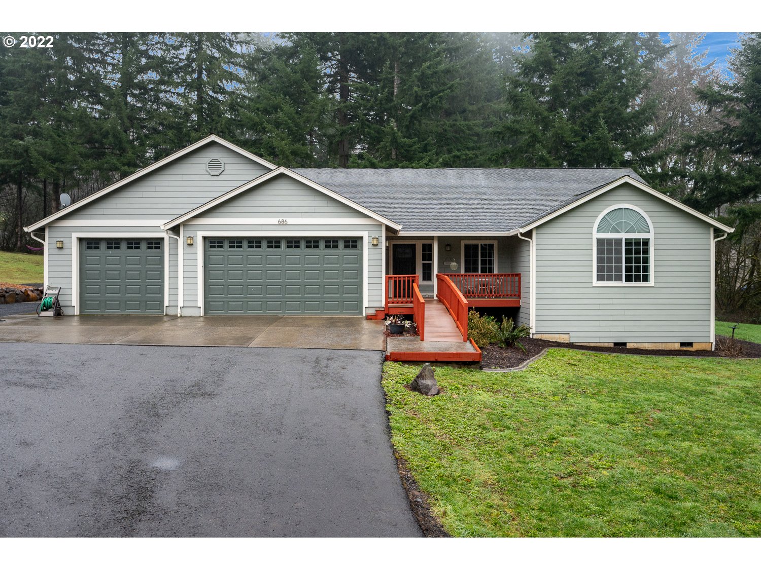 686 Eufaula Heights Road Longview, WA 98632 - Photo 1 of 29 a view of a house with a yard and sitting area