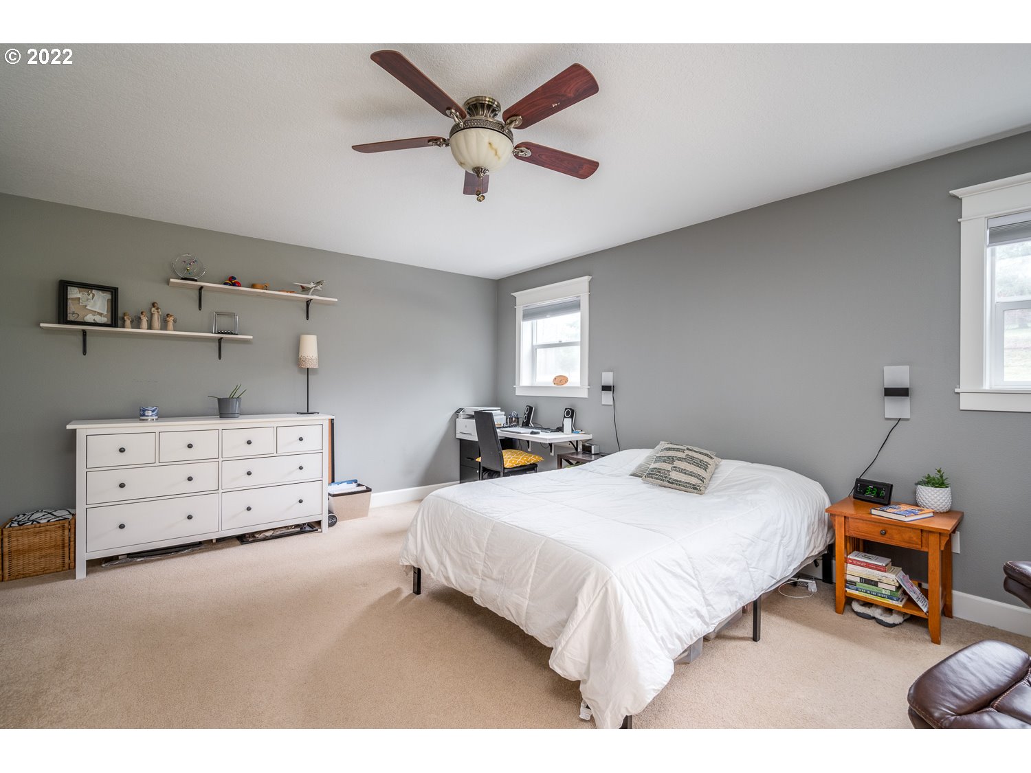 686 Eufaula Heights Road Longview, WA 98632 - Photo 15 of 29 a bedroom with a bed and wooden floor