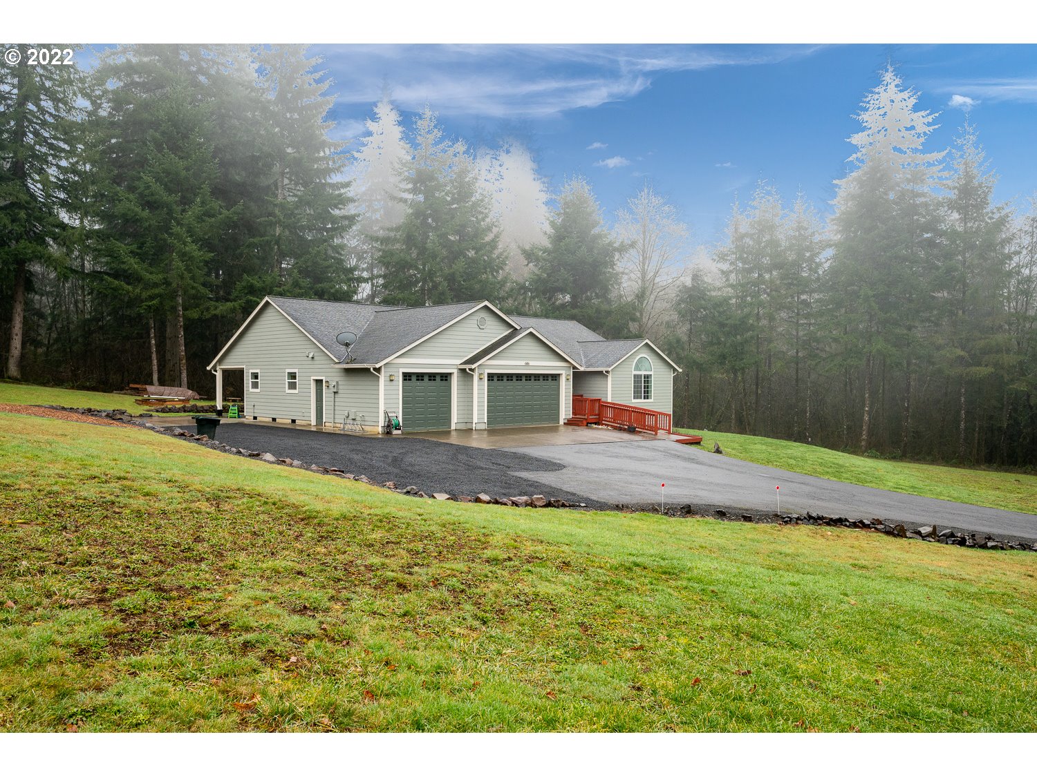 686 Eufaula Heights Road Longview, WA 98632 - Photo 4 of 29 a aerial view of a house next to a yard with large tree
