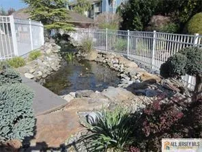 a view of a backyard with a garden